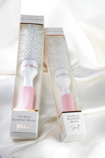 Retail packaging of The Belle Blowdry 25mm brush with product branding