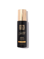 Dripping Gold luxury tanning serum bottle on a white background
