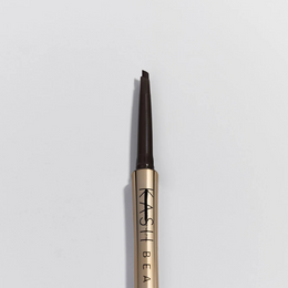 kash-brow-pencil-black-brown-with-gold-casing-and-black-tip-on-a-light-gray-background