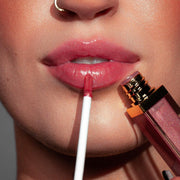 Rose Light gloss applied to lips for a shiny finish