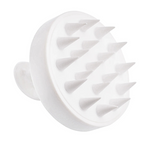 The Scalp Brush shown from the front with soft silicone bristles