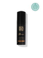 Dripping Gold tanning mousse bottle with a white background