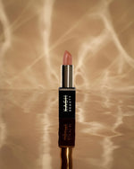 Close-up showing the smooth finish of the True Satin lipstick bullet