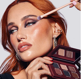 HER MAKEUP LESSON