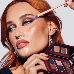HER MAKEUP LESSON