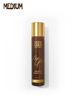 Brown spray tan bottle with gold cap on a white background