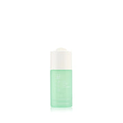 Green skincare bottle with white cap on a white background