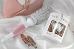 Flatlay image of The Belle Blowdry medium brush with clips and styling tools