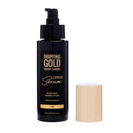 Dripping Gold luxury tanning serum bottle with pump on a white background
