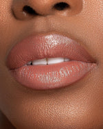 Model wearing KASH Femme lipstick with a bold evening makeup look
