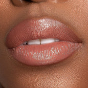 Model wearing KASH Femme lipstick with a bold evening makeup look