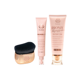 Two tubes of 'Bronze Obsession' instant tan by Biobelle and a black makeup sponge on a white background.