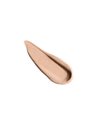 Beige makeup swatch on a white background