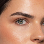 Close-up of a person's eye with detailed skin texture