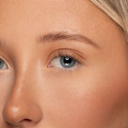 Close-up of a person's eye with a focus on the iris.