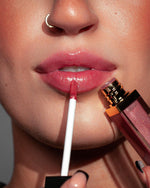 Rose Light gloss applied to lips for a shiny finish
