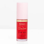 Lip oil bottle with pink cap and red body on a white background