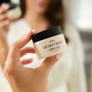 Woman applying Radiant Hydrating Cream on skin