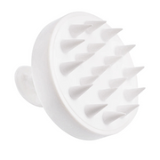 The Scalp Brush shown from the front with soft silicone bristles