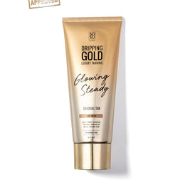 Tube of Dripping Gold tanning product on a white background