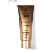 Tube of Dripping Gold Gradual Tan on a white background