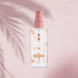 Bella Maria Summer Infused toning water bottle on a pink background